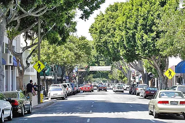 CARS GALORE SLO (pictured), Pismo Beach, and Paso Robles are all eyeing new parking policies and projects to address a crunch for spaces. - FILE PHOTO BY STEVE E. MILLER