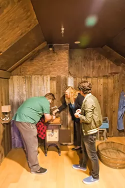 LOCKS AND DRAWERS Escape rooms like The Ultimate Escape Rooms' Gold Fever are multi-faceted puzzle games complete with secret messages, combination locks, and compartments triggered by specific actions. - PHOTO BY JAYSON MELLOM