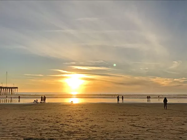 GOLDEN HOUR There's nowhere else I can feel so simultaneously at peace and inspired than on the Pacific Ocean shore. Here's Pismo Beach at sunset, after a long walk down the coast. - PHOTO BY PETER JOHNSON