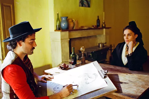 MUSE Oscar Isaac plays painter Paul Gauguin, who, along with Van Gogh, painted Madame Ginoux (Emmanuelle Seigner), in At Eternity's Gate. - PHOTOS COURTESY OF RIVERSTONE PICTURES