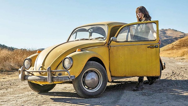 BETTER BUG Charlie (Hailee Steinfeld) discovers an old VW Bug in a junkyard that turns out to be Bumblebee (voiced by Dylan O'Brien), a Transformer bot in hiding, in Bumblebee. - PHOTO COURTESY OF ALLSPARK PICTURES