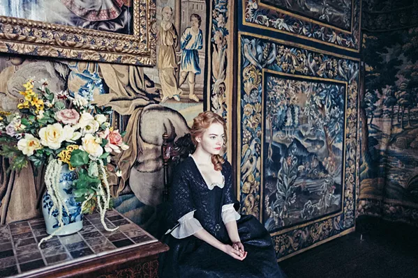 SYCOPHANT Abigail (Emma Stone), a new servant to Queen Anne, connives herself into a position of power, in The Favourite. - PHOTO COURTESY OF ELEMENT PICTURES