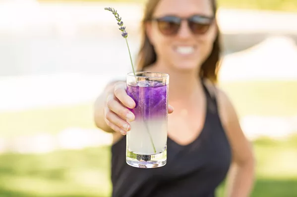 CLINKING GLASSES Joslin works with the bride and groom to create signature drinks for their big day. - PHOTO COURTESY OF SAMANTHA JOSETTE PHOTOGRAPHY
