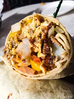 NOT A BASIC B You can be a basic B and get the regular old breakfast burrito at Sidewalk Café, or you can go big with tri-tip, eggs, potatoes, cheese, tomatoes, peppers, and onions. I say go big. - PHOTOS COURTESY OF KACEY COLLINS