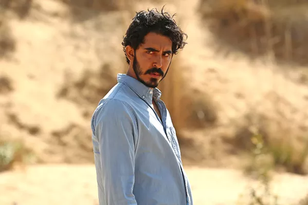 MAN ON A MISSION Dev Patel stars as Jay, a mysterious British Muslim man journeying across Pakistan and India, in writer-director Michael Winterbottom's The Wedding Guest, screening exclusively at The Palm. - PHOTO COURTESY OF INDIA TAKE ONE PRODUCTIONS