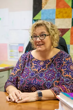 RAISING AWARENESS Early childhood education leaders like Tonya Iversen, director of the Cal Poly ASI Children's Center, are increasingly concerned about meeting the child care needs in the community and attracting quality teachers to the field. - PHOTOS BY JAYSON MELLOM