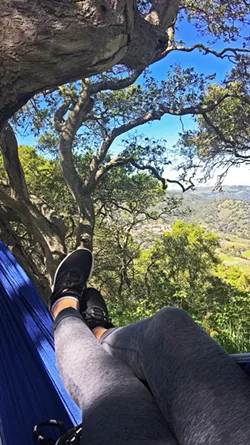 ENJOY NATURE Setting up a hammock is relatively easy, and the best part is being able to sit or lie in your hammock and enjoy being surrounded by nature. - PHOTOS BY KAREN GARCIA