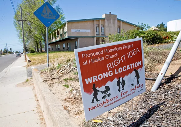 APPROVED Despite opposition from neighborhood residents (pictured), the SLO County Board of Supervisors voted to authorize a $2.7 million allocation of state grant funds to a homeless services project planned in Grover Beach. - FILE PHOTO BY JAYSON MELLOM