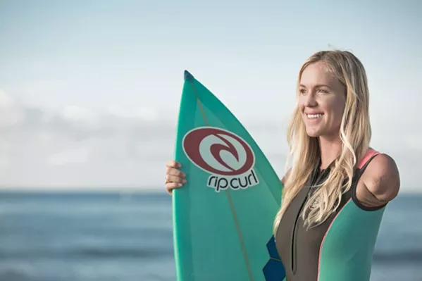 DETERMINATION Bethany Hamilton may have lost her arm to a tiger shark attack, but that didn't stop her from becoming a pro surfer, chronicled in the new documentary Bethany Hamilton: Unstoppable, screening exclusively at The Palm Theatre. - PHOTO COURTESY OF AARON LIEBER