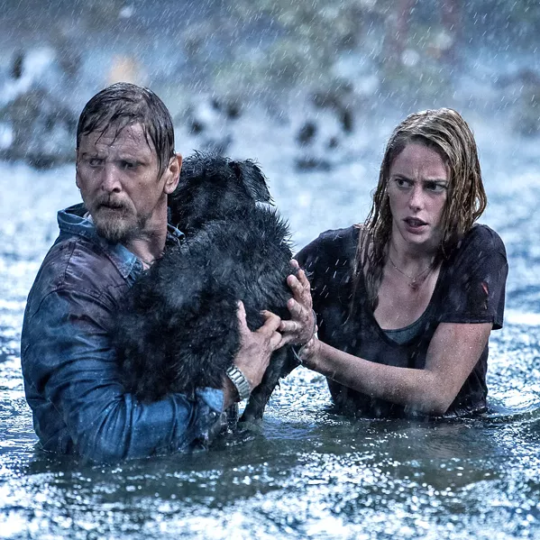 SURVIVE During a hurricane, Haley Keller (Kaya Scodelario, right) returns home to save her father, Dave (Barry Pepper), and the family dog but discovers floodwaters are infested with alligators, in Crawl. - PHOTO COURTESY OF PARAMOUNT PICTURES