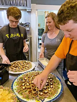 ERIN AND HER INTERNS Program Manager Erin Lawrence supports two interns making food art. - PHOTO COURTESY OF CHRISTINA DILLOW