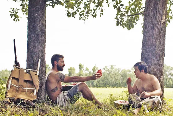 ODYSSEY Small-time outlaw, Tyler (Shia LeBeouf, left), helps Zak (Zack Gottsagen), a young man with Down syndrome, pursue his dream of becoming a pro wrestler, in The Peanut Butter Falcon. - PHOTO COURTESY OF ARMORY FILMS