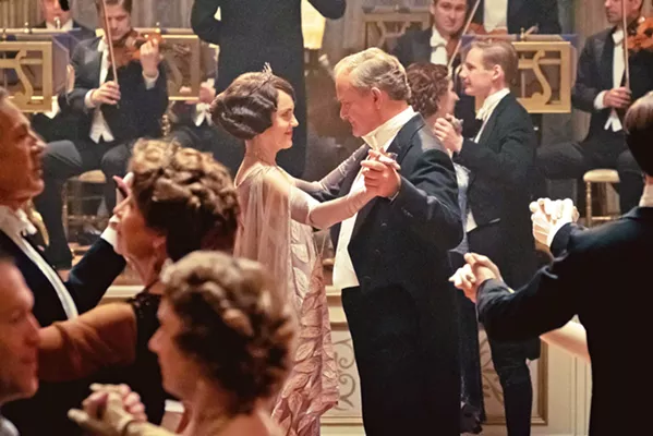 GOOD TO BE RICH Violet Crawley (Elizabeth McGovern) and Earl of Grantham Robert Crawley (Hugh Bonneville) take a spin across the dance floor in Downton Abbey, based on the TV series of the same name. - PHOTO COURTESY OF CARNIVAL FILM & TELEVISION