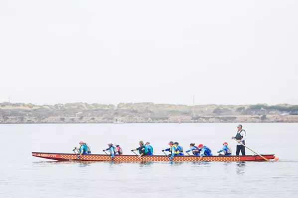 IN THE SAME BOAT The Central Coast Dragon Boating Association offers several boat trainings and activities each week in Morro Bay, for a range of skill levels. The nonprofit was founded in 2007 by a group of breast cancer survivors, and it's grown to more than 100 members today. - PHOTOS BY JAYSON MELLOM
