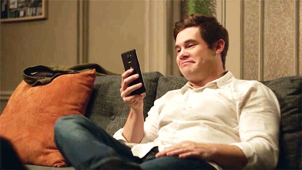 PHONER Adam Devine is Phil, a lonely tech writer whose new A.I. operating system named Jexi (voiced by Rose Byrne) gives him the confidence he needs to make friends ... until "she" gets jealous, in Jexi. - PHOTO COURTESY OF CBS FILMS