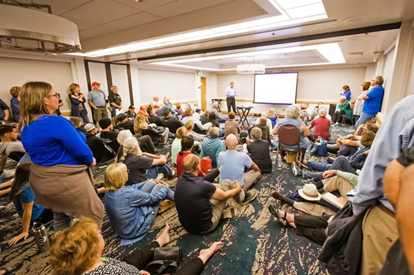 DUNES DEBATE Hundreds of people from across the state attended a California Coastal Commission meeting in San Luis Obispo on July 11, where commissioners considered recommendations to limit off-highway vehicle riding in the Oceano Dunes State Vehicular Recreation Area. - FILE PHOTO BY JAYSON MELLOM