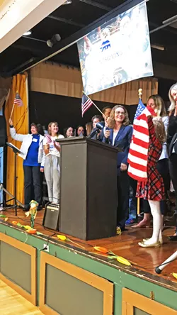 STUMP SPEECH Flanked by supporters, Dawn Addis announces her candidacy for state Assembly at a SLO Progressives Club event on Nov. 7. - PHOTO BY PETER JOHNSON