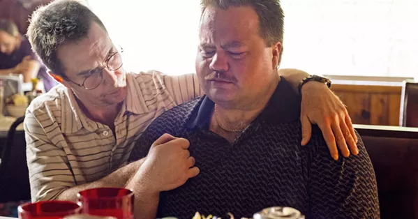 SWEET RELIEF Security guard Richard Jewell (Paul Walter Hauser) is comforted by his lawyer Watson Bryant (Sam Rockwell) after he's finally proven completely innocent of the 1996 Atlanta Olympics bombing. - PHOTOS COURTESY OF 75 YEAR PLAN PRODUCTIONS
