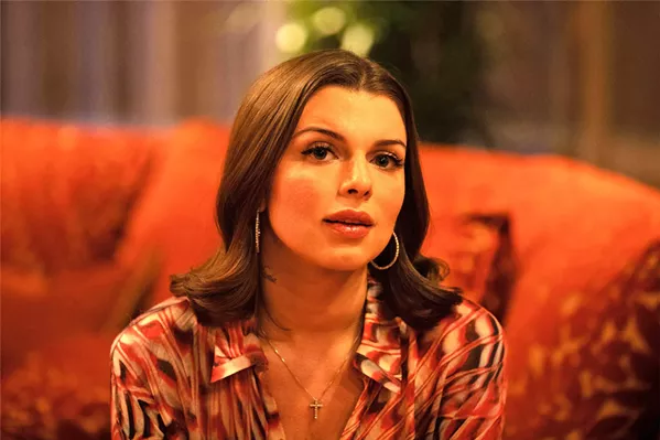 SIDE-PIECE Julia (Julia Fox) works in Howie's jewelry store but is also his mistress, which sends her down a dangerous rabbit hole with thugs and shady deals. - PHOTOS COURTESY OF A24