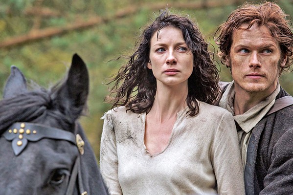 TIME TRAVELER Claire Randall (Caitriona Balfe), an English combat nurse from 1945, travels back in time to 1743 Scotland, where she falls in love with clansman Jamie Fraser (Sam Heughan), in the Starz series Outlander. - PHOTO COURTESY OF TALL SHIP PRODUCTIONS