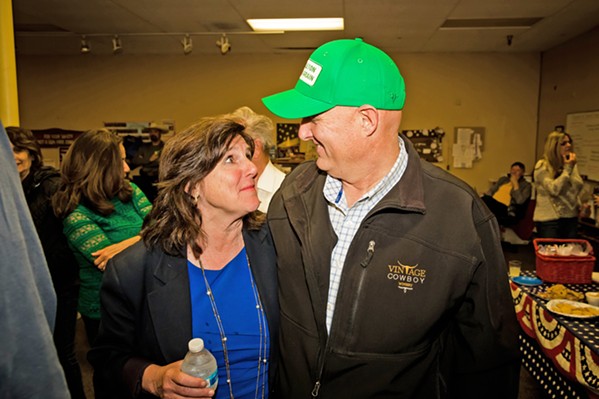 SIGHS OF RELIEF San Luis Obispo County 5th District Supervisor Debbie Arnold (left) and 1st District Supervisor John Peschong celebrate early leads over their election opponents on March 3 at Republican Party headquarters in Atascadero. - PHOTO BY JAYSON MELLOM