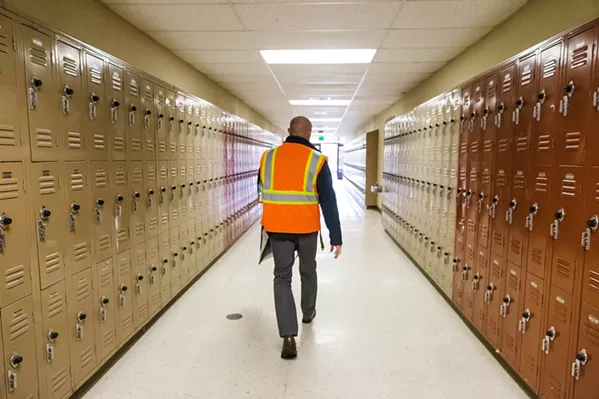 SURVIVAL INSTINCTS SLO High School Principal Leslie O'Connor walks the halls during a lockdown drill in January 2019. On Feb. 28 of this year, a scheduled earthquake drill at SLO High accidentally turned into a lockdown that students thought was real. - FILE PHOTO BY JAYSON MELLOM