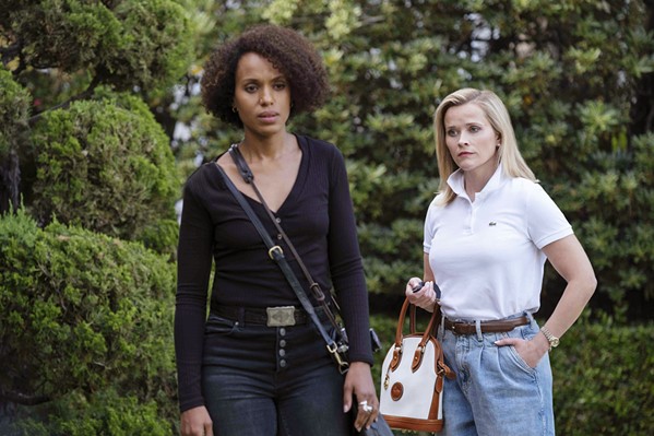 FRENEMIES Picture perfect Elena Richardson (Reese Witherspoon, right) and poor single mom Mia (Kerry Washington) develop an uneasy relationship after Elena rents Mia an apartment and hires her to help around her house, in Little Fires Everywhere, available on Hulu. - PHOTO COURTESY OF HULU