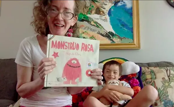 PARENTS HELPING PARENTS Family Resource Specialist Sara McGrath leads a virtual bilingual reading session with her 8-year-old son, Liam. McGrath works at Parents Helping Parents of SLO, an organization that helps connect the families of children with special needs to available resources. - SCREENSHOT FROM FACEBOOK
