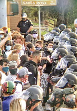 AFTER ACTION The SLO Police Department is preparing a report following recent protests, including the June 1 protest that ended in police using tear gas. - FILE PHOTO BY PETER JOHNSON