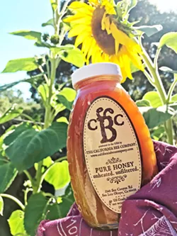 PURE. UNFILTERED. California Bee Company honey is local, pure, unheated, unfiltered honey love. Check out the deep color in this expert batch of wildflower honey. - PHOTO BY BETH GIUFFRE