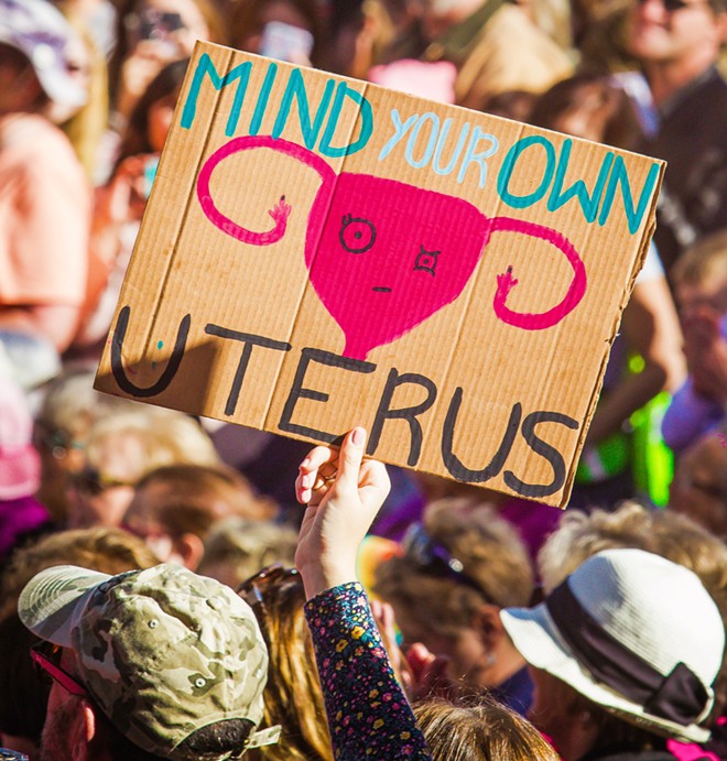STILL FIGHTING Although Women's March SLO can't currently organize any mass public gatherings such as this 2018 march, it's still highlighting issues such as reproductive health care access&mdash;albeit virtually.