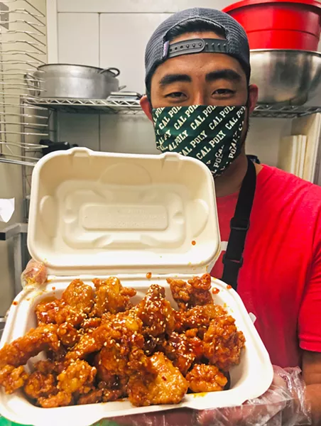 FESTIVE FUSION Matt Yoon of Bap Jo creates flavor bombs such as the Korean hot fried chicken: soaked overnight in buttermilk, dusted with a flour mixture, twice fried in peanut oil for extra crispiness, and coated in a 16-ingredient housemade spicy sauce. - PHOTO COURTESY OF MATT AND HOPE YOON