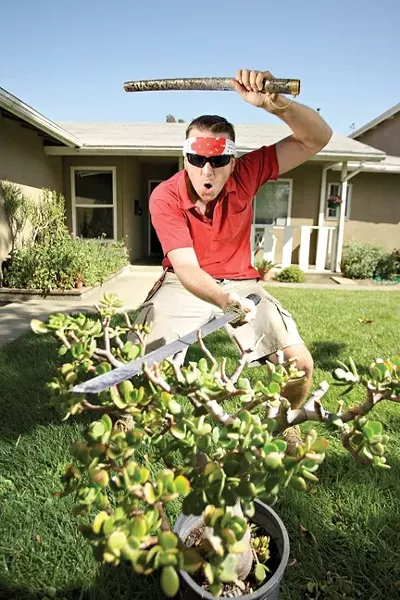 GARDEN TOOL: Morgan Hunt, proprietor of Morgan Hunt Landscaping, is rocking the Public Access Channel with his landscaping show, The Gardenator. - PHOTO BY STEVE E. MILLER