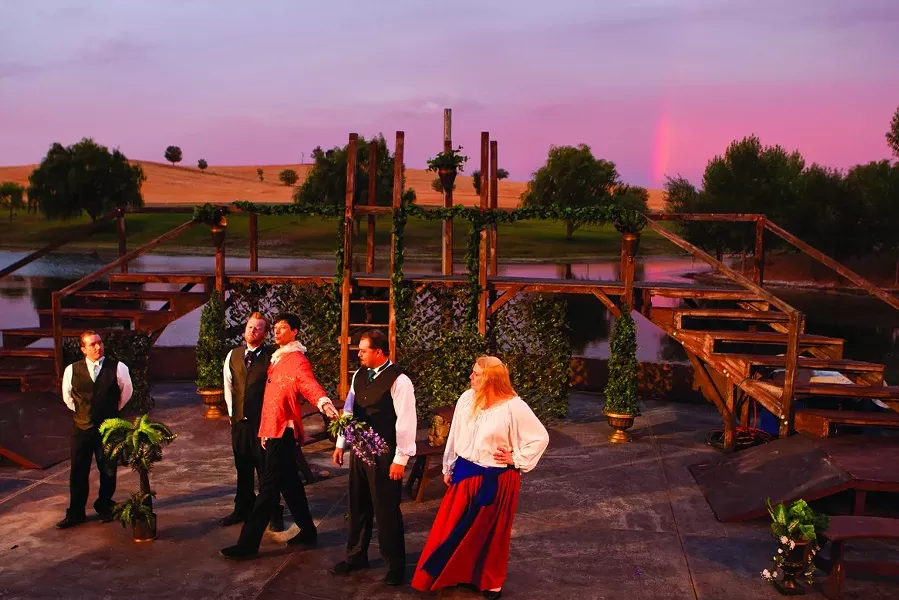 SHAKESPEARE AT TWILIGHT: Charles Hayek, Corey Schonauer, Sean Peters, Matthew Hanson, and Krystal Kirk (left to right) rehearse Love’s Labour’s Lost as the sun sets on the River Oaks Amphitheatre, the outdoor stage at Paso’s River Oaks Hot Springs. - PHOTO BY STEVE E. MILLER