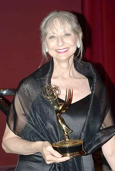 ACTOR EXTRAORDINAIRE : Rae Stone—an actor, teacher, and supporter of theater on the Central Coast—died of cancer Friday, Aug. 24, while staying with her mother in Florida. Locals, however, are only recently learning of her passing. Pictured is Stone in 2006 with the Emmy she won for her on-air work on a PSA. - PHOTO BY SHAMA RAJ