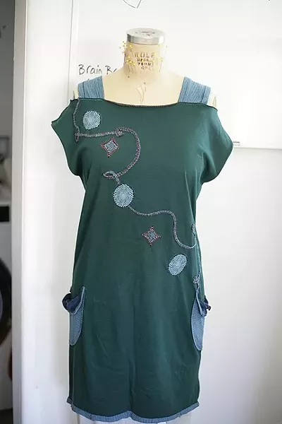 UPCYCLED: Cordoba reworked a T-shirt into a dress, adding material from another garment for pockets and straps, as well as decorative designs and stitching. - PHOTO BY GLEN STARKEY