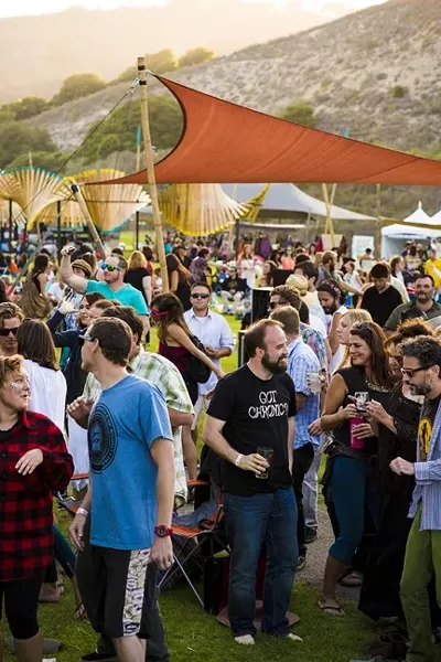 PARTY ON!: The crowds were in good spirits and well fed and lubed! - PHOTO BY HENRY BRUINGTON