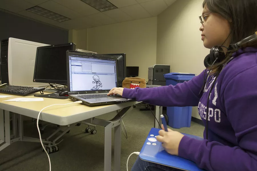 GAMES AS ART : Cal Poly student Phyllis Douglas was one of the few artists available at the Global Game Jam. - PHOTO BY STEVE E. MILLER