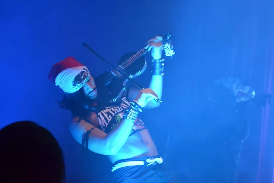 DIRTY VIRTUOSO: Maximilian “Dirty” Sanchez shredded on electric violin. - PHOTO BY RHYS HEYDEN