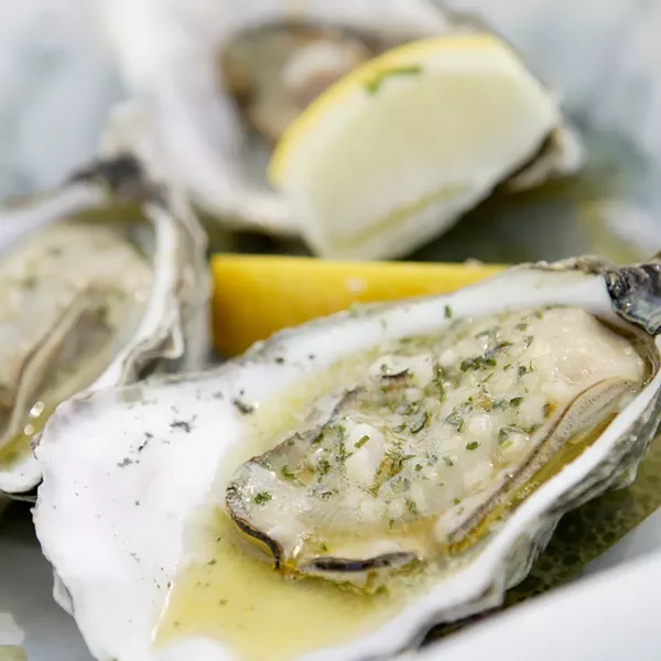 ON THE HALF SHELL : State health officials have closed down some oyster farming areas of Morro Bay because of water pollution. - PHOTO BY STEVE E. MILLER