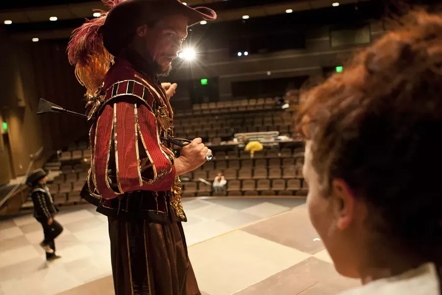 A ROYAL PAIN : Nik Johnson is a flamboyantly fussy King Louis III in The Three Musketeers, staged at Cuesta College. - PHOTO BY STEVE E. MILLER