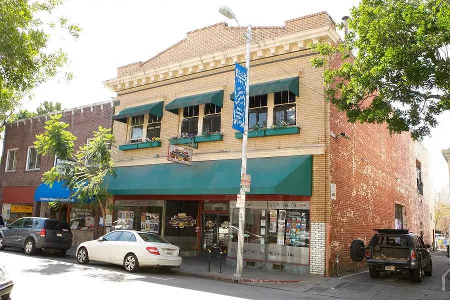 UH OH! : The building containing Downtown Brew has five more years to comply with city earthquake codes - PHOTO BY STEVE E. MILLER