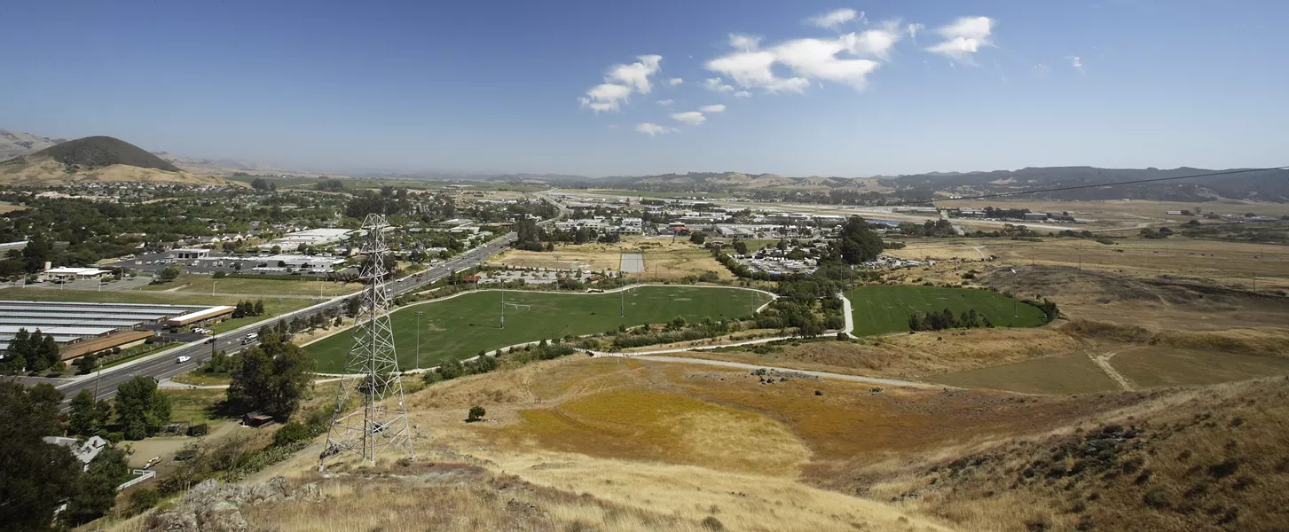 PARADISE SAVED? : A referendum could prevent Prado Road from bordering the Damon-Garcia sports fields and linking up with Broad Street. - PHOTO BY STEVE E. MILLER