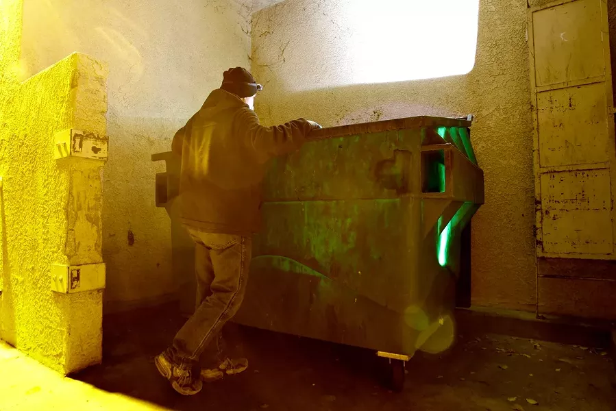 TRASH TO TREASURE : Jim, a homeless Vietnam combat vet with Post Traumatic Stress Disorder, supplements his meager government assistance by recycling. - PHOTO BY STEVE E. MILLER