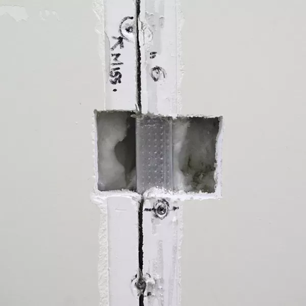 CRACKS IN THE WALL : The nearly $25 million SLO County Government Center is riddled with cracked drywall and other associated problems. County officials are suing the construction team they think is responsible for the problems. - PHOTO BY STEVE E. MILLER