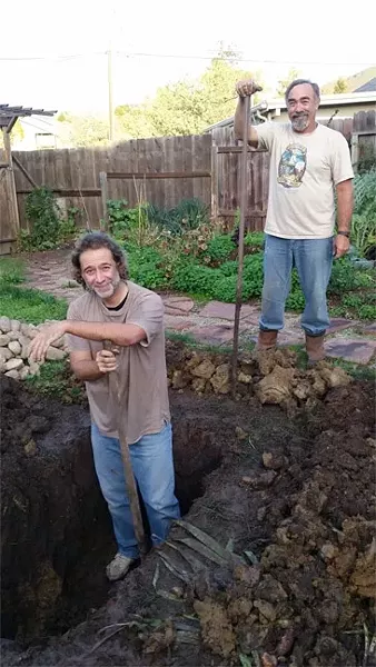 DIGGING THE PIT: Ray Lee (left) and Keith Pellemeier helped dig the roasting pit. - PHOTO BY GEORGE GRIFFIN AND GLEN STARKEY