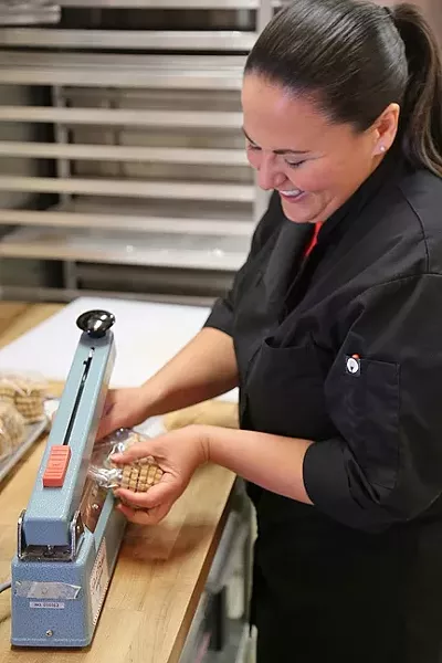 THE SWEETEST THING: Annie Farrell is proud chief cook, and bottle washer at Just Baked SLO. - PHOTO BY DYLAN HONEA-BAUMANN