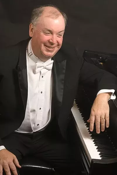 MAGIC FINGERS : Cal Poly Music Department Chair and pianist extraordinaire W. Terrence Spiller will deliver an evening of Mozart, Ravel, Bartok, and Liszt on Jan. 9, in the Spanos Theatre at Cal Poly. - PHOTO COURTESY OF CAL POLY MUSIC DEPARTMENT