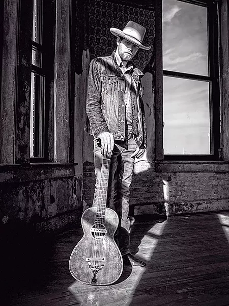 ROAD WARRIOR: Joshua Kloyda brings his acoustic blues sounds to Old Cayucos Tavern on Aug. 26. - PHOTO COURTESY OF JOSHUA KLOYDA