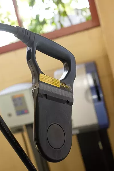 WAND OF POWER : This “puck-style” electric vehicle charger, seen at a handful of parking spaces around the city of SLO, can only be used by a handful of working county vehicles. - PHOTO BY STEVE E. MILLER